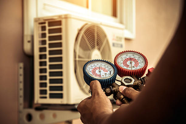 Professional Ac Installation technician working in Pinehurst, ID